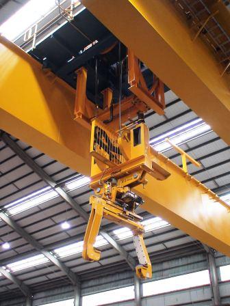 Horizontal Coil Tong with Double Rack and Pinion at fully automated crane Horizontal Coil Tong with Double Rack and Pinion at fully automated crane